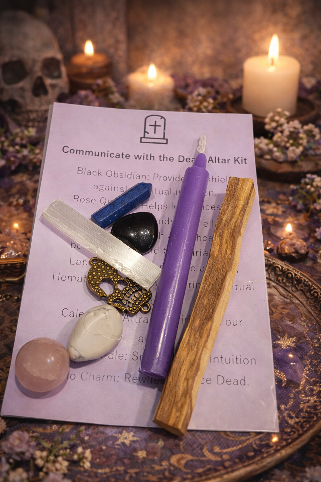 Wiccan altar kit with candles, crystals, and a skull on a dark background